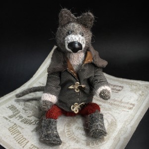 Фото Волк в пальто авторская игрушка