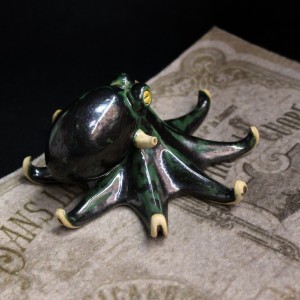 Фото Фигурка зелёного осьминога