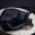 Фото Фермуар - чёрная кожаная сумочка-1